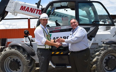 Kevin Fisher MD of CEA handing over keys to the Manitou Telehandler