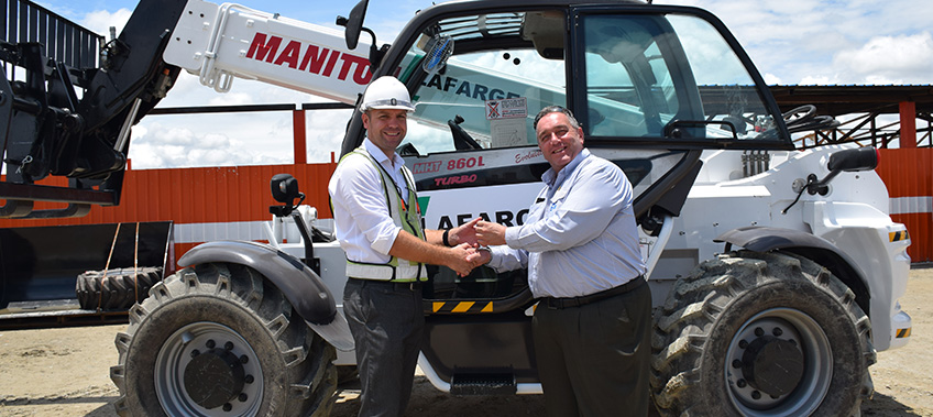 Kevin Fisher MD of CEA handing over keys to the Manitou Telehandler