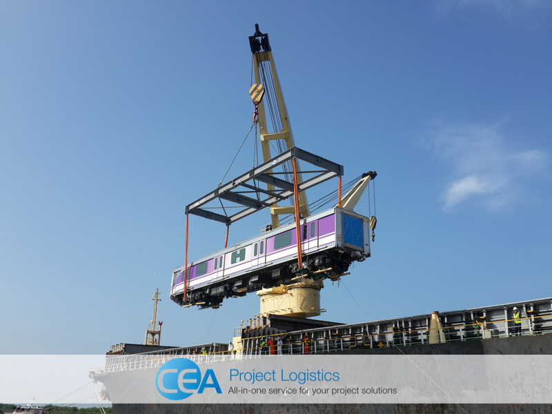 Train carriage being lifted from ship