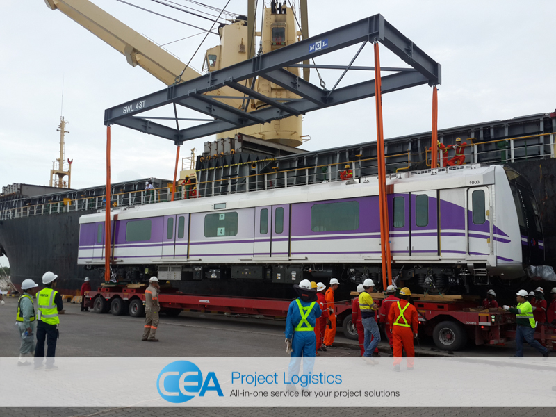 Train carriage being lifted from ship