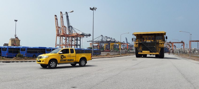 CEA Project Logistics Escort vehicle on port - Free Trade Zone